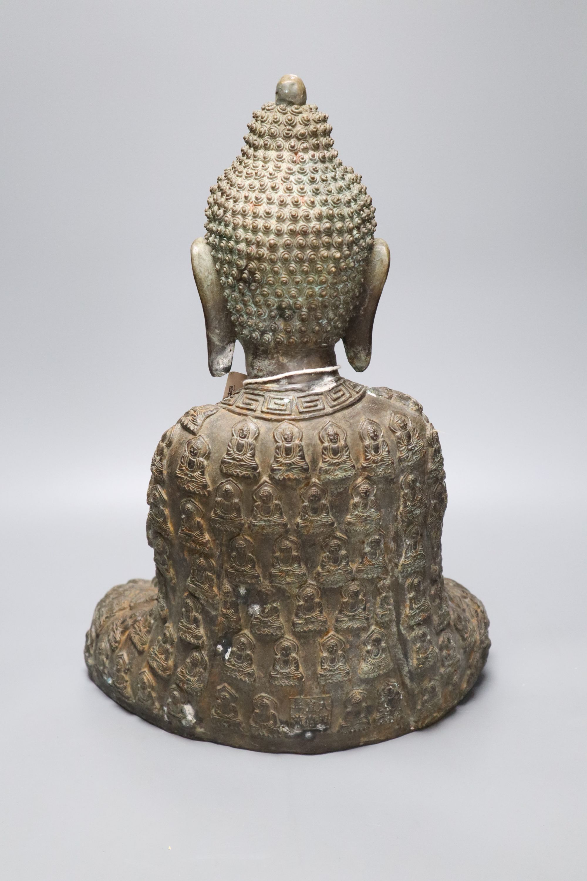A large bronze seated figure of Buddha, height 44cm